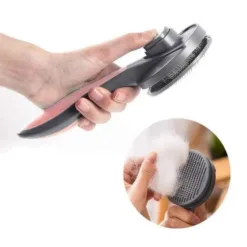 Dog and cat hair comb with button to detangle hair